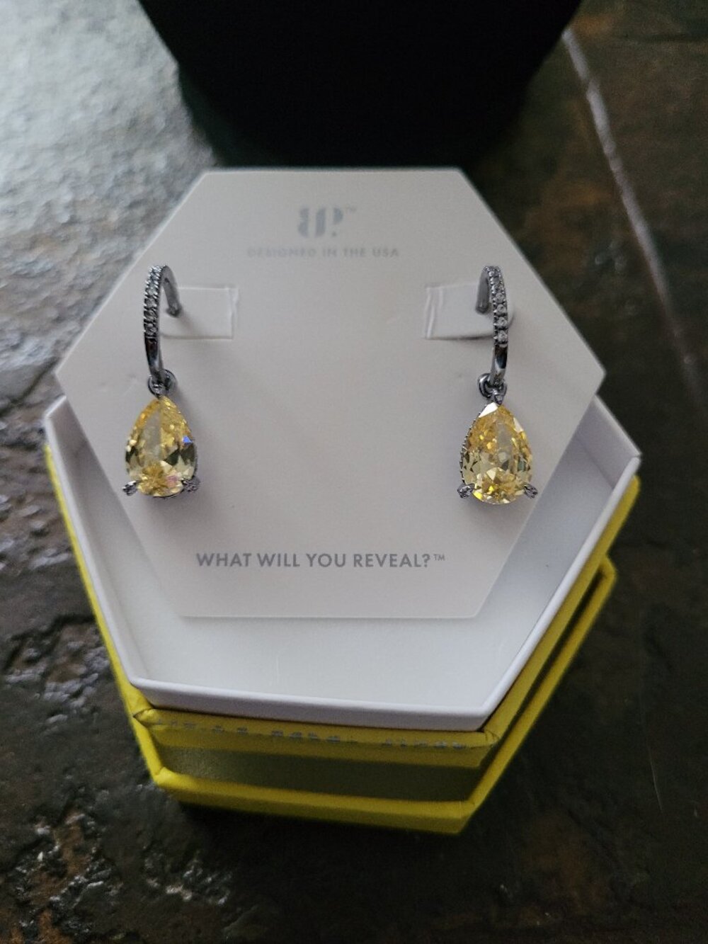 BP yellow lemon cz stones set in a bold dark hematite plating